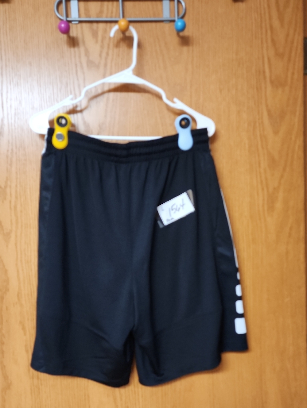 Nike Black Athletic Shorts with White Side Accents mens L number 1564